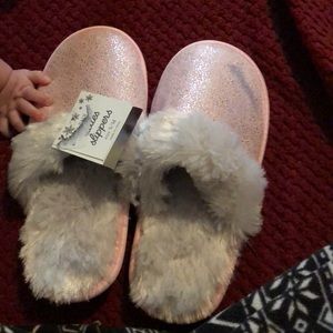 Small pink fuzzy slippers